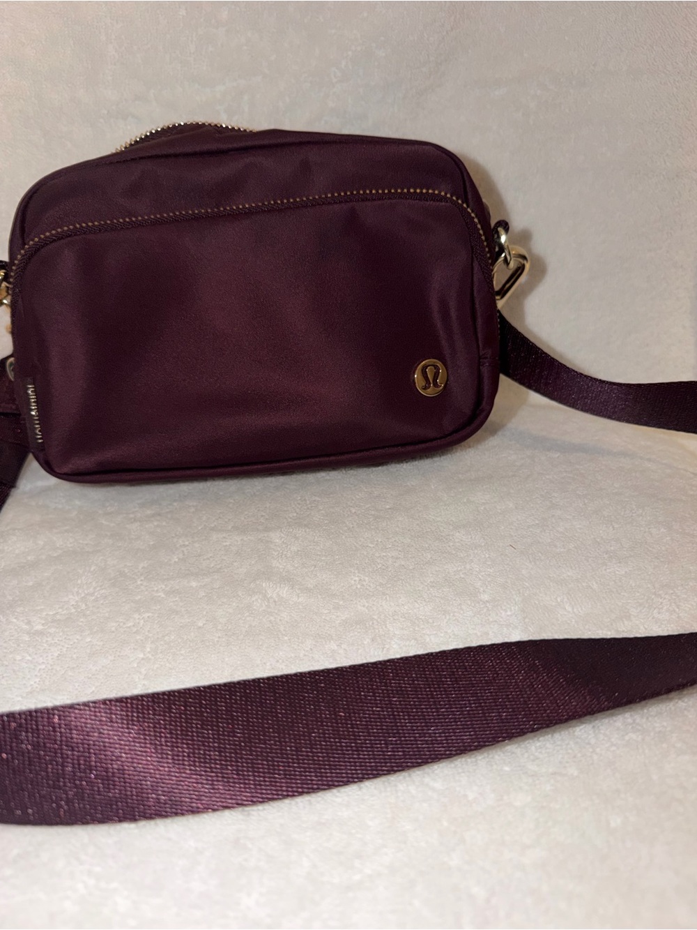 lululemon athletica Plum Belt Bag with Gold Accents